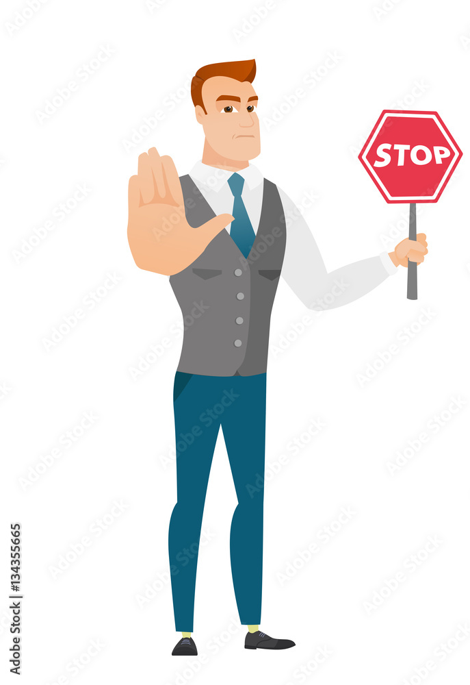 Caucasian businessman holding stop road sign.