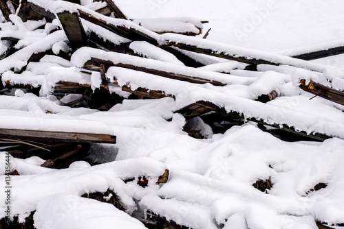 Pile of rubble covered in snow © photosampler