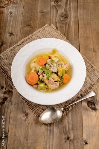 pork stew with carrot, celery, potato and parsley