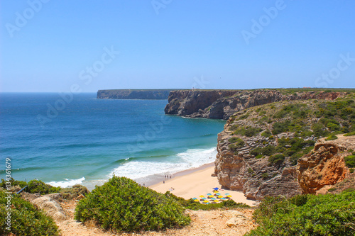 Landscape atlantic  Beliche Beach next to Sagres  Saint Vincent Cape  Algarve  Portugal in blue sky background.
