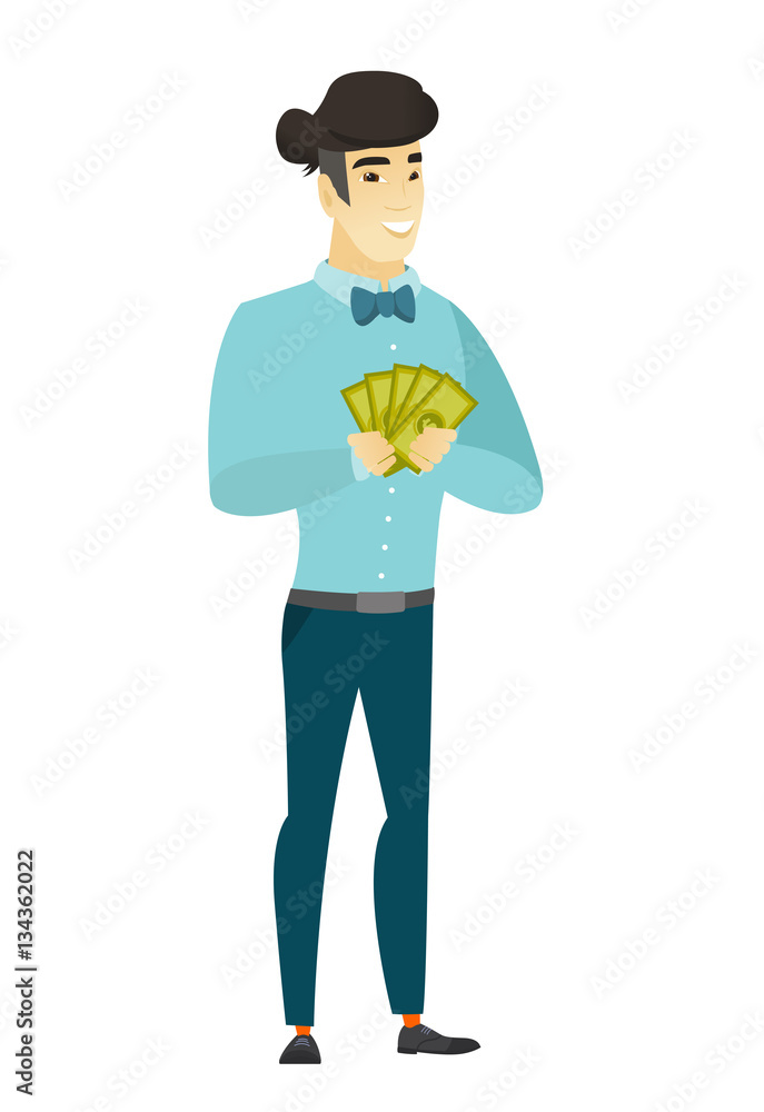 Happy asian businessman holding money.