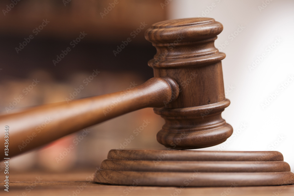 law theme, mallet of the judge, justice scale, books, wooden des