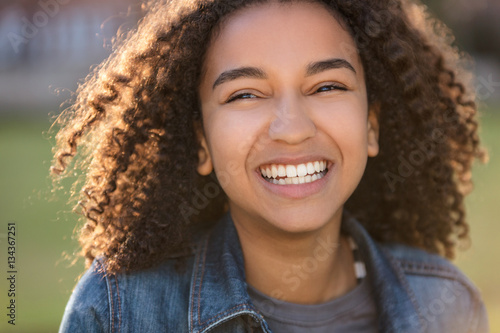 Mixed Race African American Girl Teenager With Perfect Teeth photo