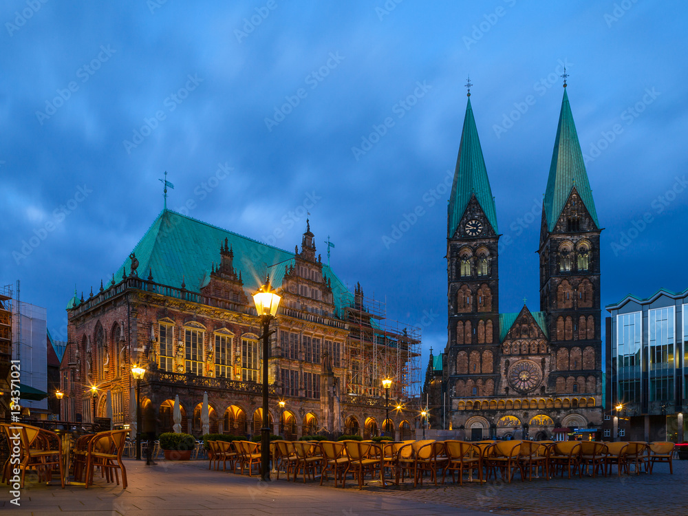 City hall and St. Peter Cathedral on the market square. Everining view with illumination.