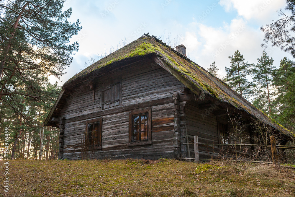 View of the rustic farm dwelling. Wooden architecture of North and Baltics