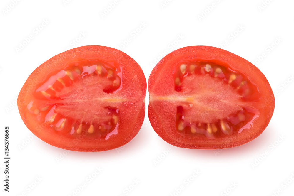 Isolated tomatoes. Pieces of cut fresh tomatoes over white background, with clipping path