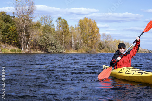 Traveling by kayak on the river on a sunny day. © trek6500