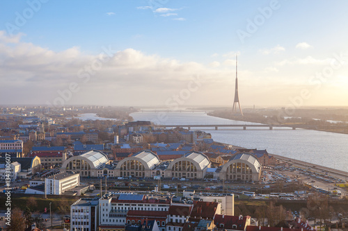 View of Central Market, Daugava River and Riga TV and radio tower - Latvia. Sunny summer day, backlight