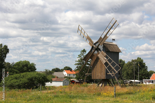 Old wooden windmill in the trees