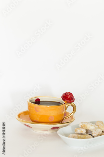 Beautiful handmade orange cup with red rose