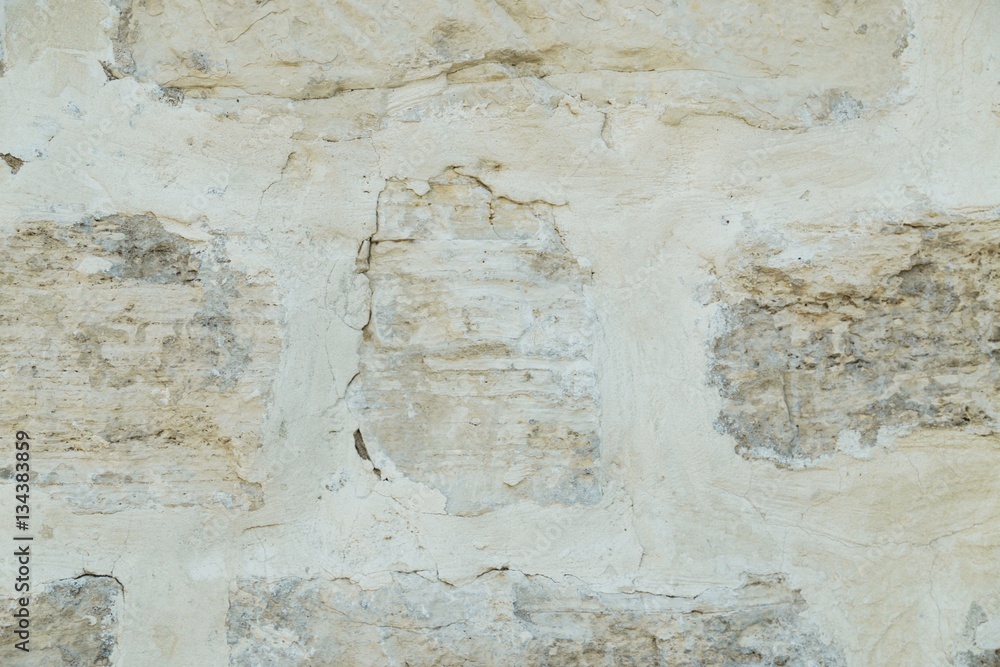 Stone wall pattern. Big concrete bricks outside.