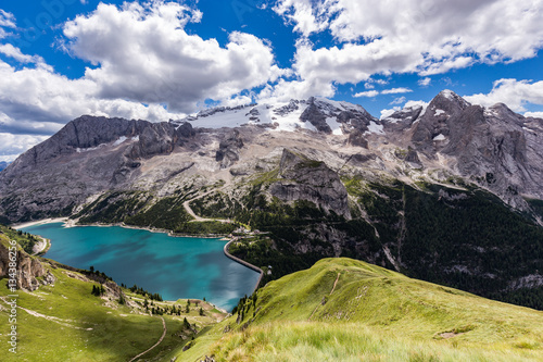View of the Marmolada  also known as the Queen of the Dolomites and the Fedaia Lake. Marmolada is the highest mountain of the Dolomites  situated in northeast of Italy.
