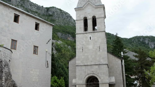 Building of the Church of the Holy Trinity. The center of courtyard is in lower monastery of Ostrog. The monastic residences. Montenegro

