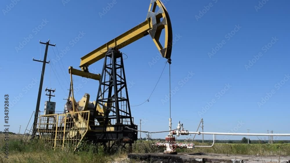 The pumping unit on a well. Equipment of oil wells. The pumping unit on a well. Equipment of oil wells.