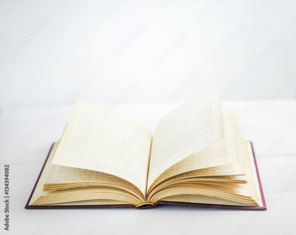 Book opened on white background Book opened on white background
