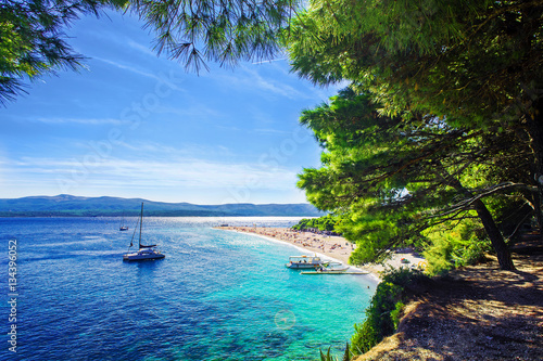 Beautiful beach Zlatni Rat or Golden Cape on island Brac in Croatia photo