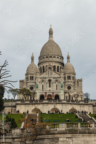PARIS, FRANCE - DECEMBER 25, 2015: Sacre Coeur Basilica in winter day. Large medieval cathedral. Basilica of Sacred Heart. 