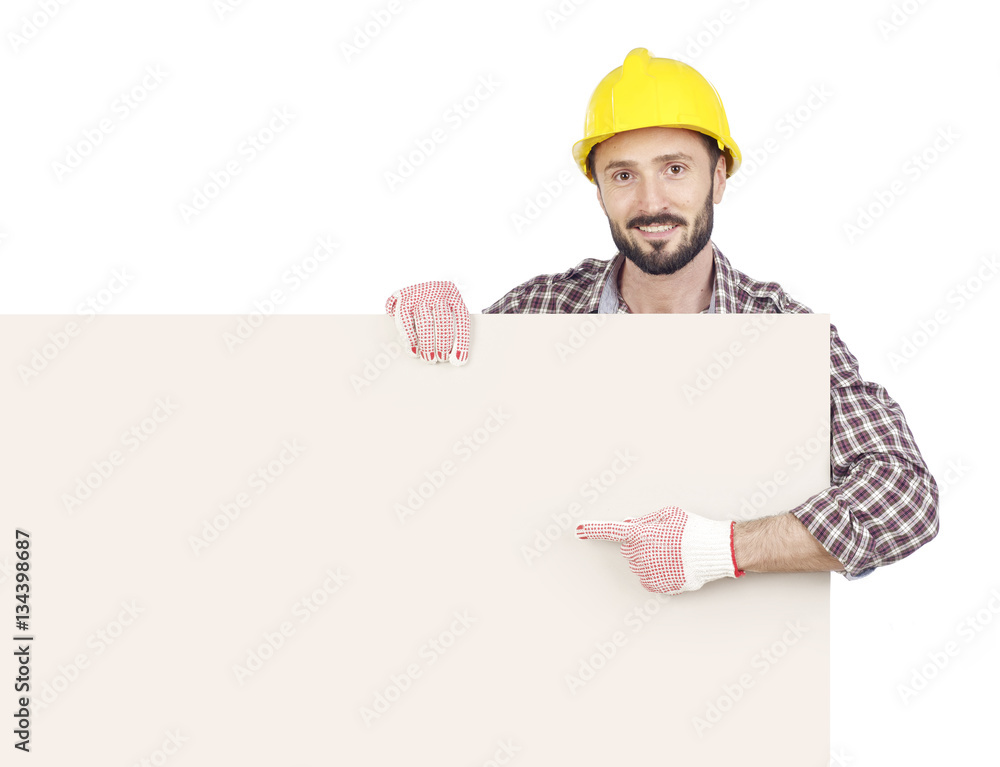 Handyman pointing at blank board Handyman pointing at blank board