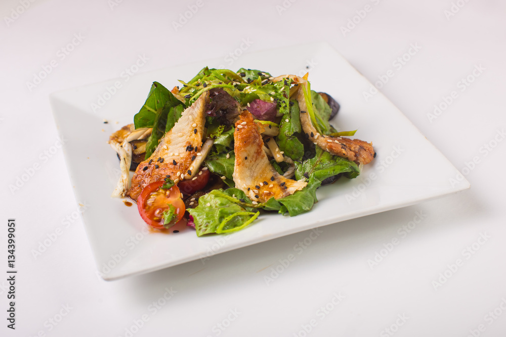salad with eel on a white background salad with eel on a white background