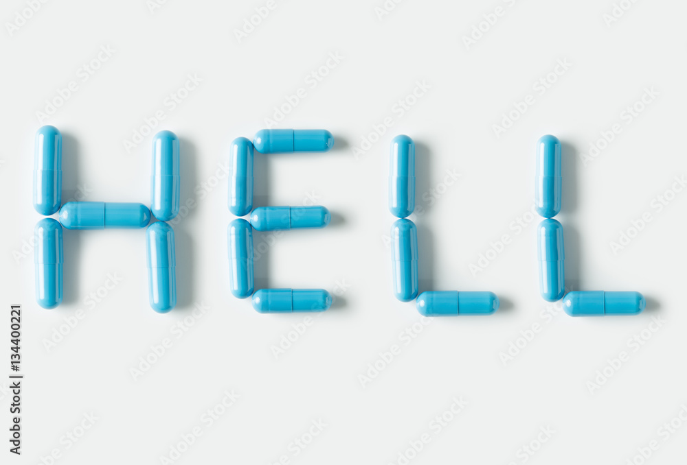 Blue Pills capsules in shape of word Hell. Life concept isolated. Blue Pills capsules in shape of word Hell. Life concept isolated.