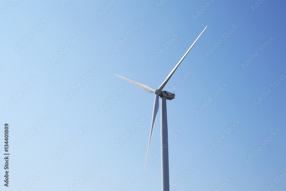 Windmill on blue sky background Windmill on blue sky background
