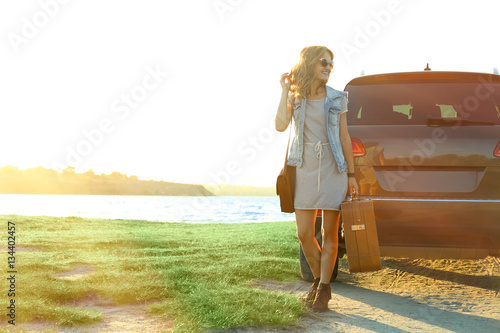 Beautiful young woman near ...