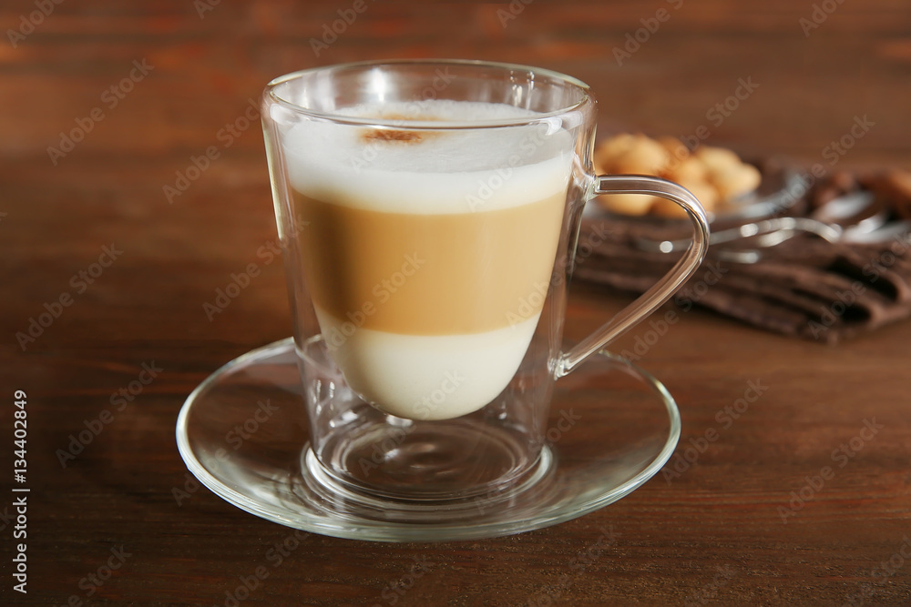 Cup of coffee on wooden background Cup of coffee on wooden background