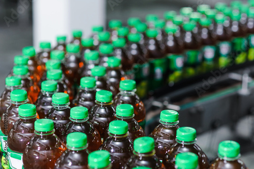 bottles of juice on a production line