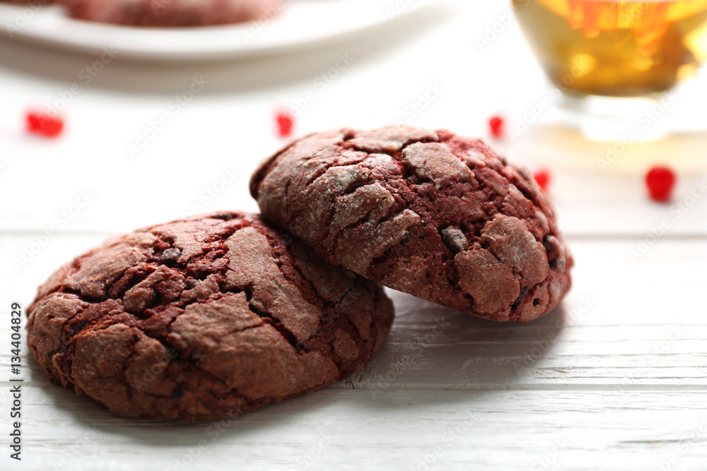 Delicious chocolate cookies on white wooden table Delicious chocolate cookies on white wooden table