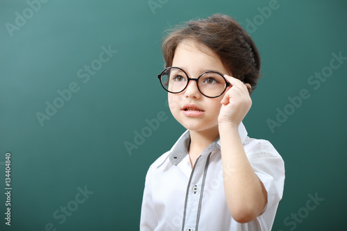 Cute little boy in glasses ...