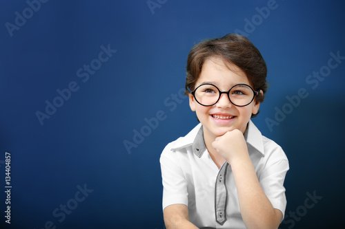 Cute little boy in glasses ...