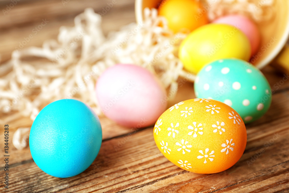 Colourful Easter eggs on wooden table, closeup Colourful Easter eggs on wooden table, closeup