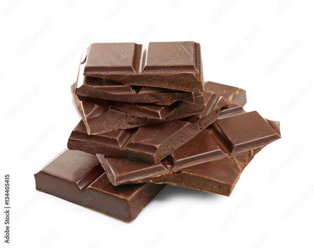 Broken dark chocolate pieces on white background Broken dark chocolate pieces on white background