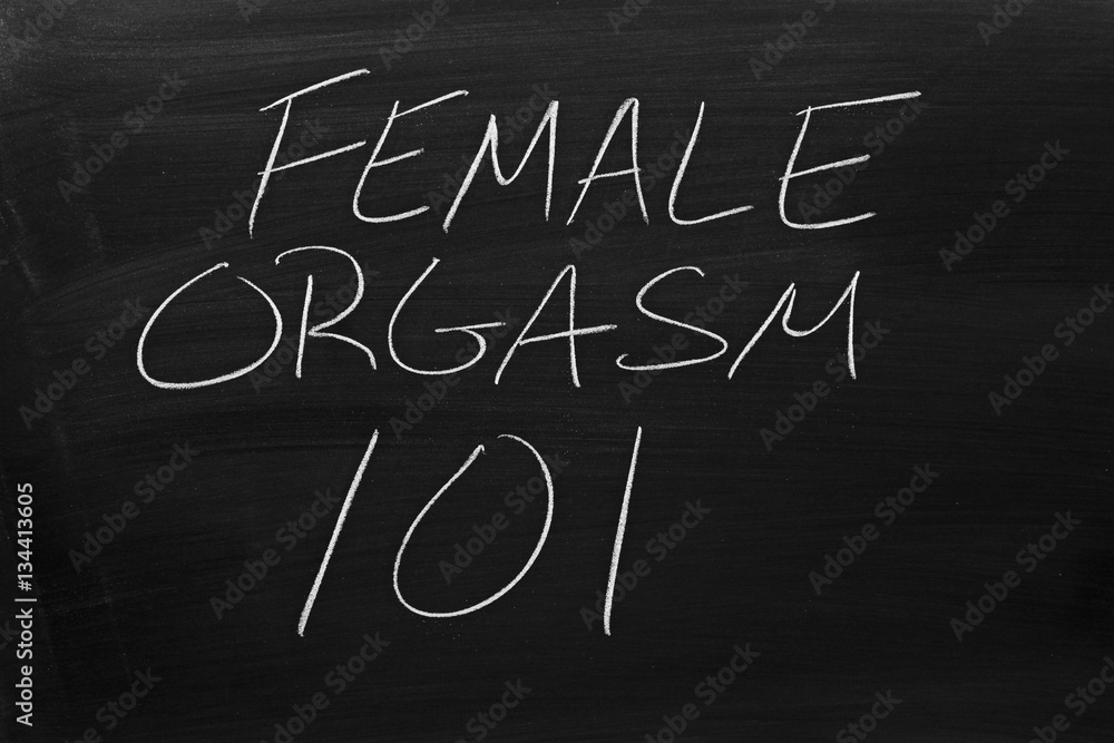 The words "Female Orgasm 101" on a blackboard in chalk Stock Photo