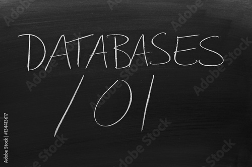 The words  Databases 101  on a blackboard in chalk