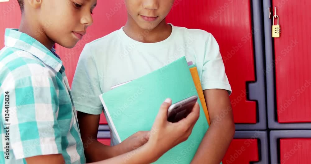 Slow motion of schoolkids using mobile phone in school 4k Slow motion of schoolkids using mobile phone in school 4k