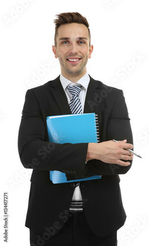Young teacher with notebook...