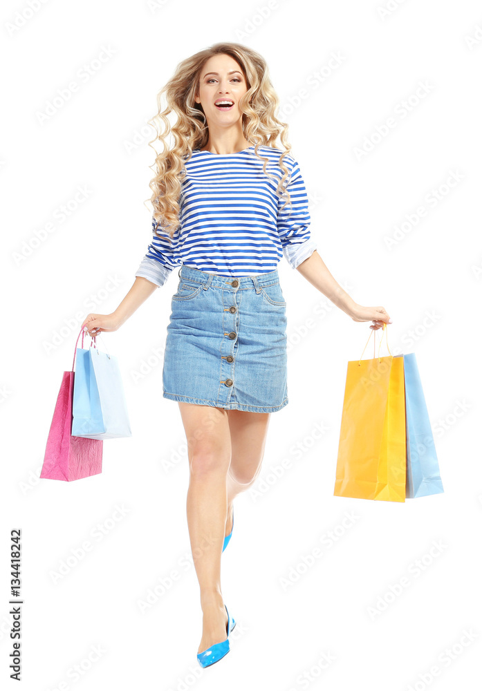 Woman with shopping bags on white background