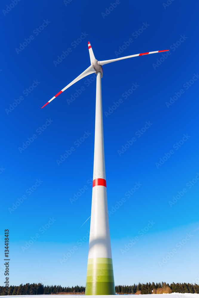 wind turbine against blue sky
