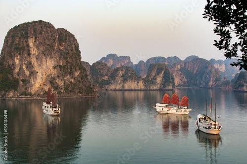 Boats sit in the harbor in Halong Bay, Vietnam