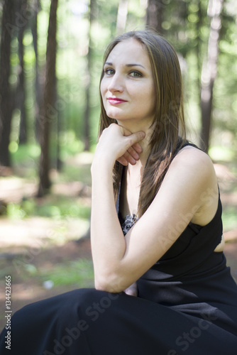 Beautiful young girl walking in a fairy forest. © sanchos303