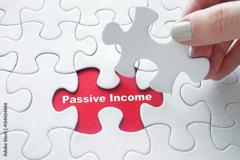 Fototapeta premium Passive Income on jigsaw puzzle