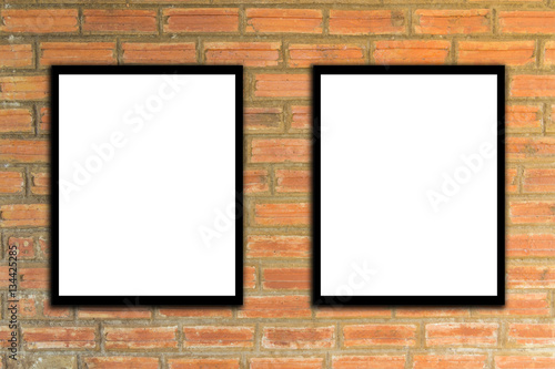 Mock up poster fram and brick wall hipster or vintage.