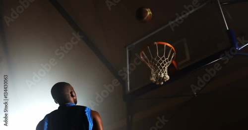 Sportsman playing basketball in basketball court 4k