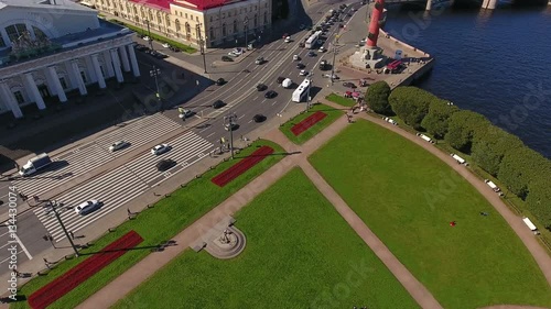 Road traffic is in the Spit of Vasilyevsky island. The Exchange square and Rostral columns. Top view. St. Petersburg, Russia with and Rostral columns. Top view. St. Petersburg, Russia
 photo