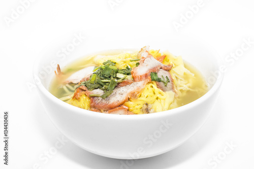Yellow noodles on white background
