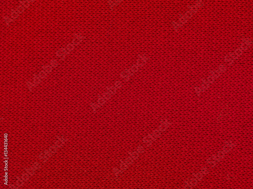 red texture of a sweeter, close up, copy space 