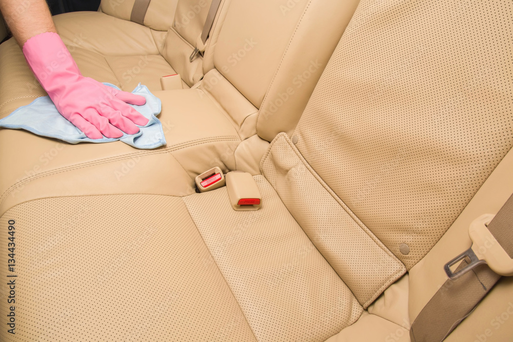 Car interior leather seats professionally chemical cleaning with cloth