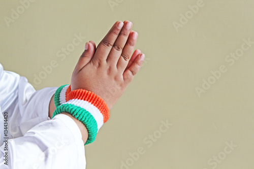 kid wearing Tricolor wrist band - colors of the flag of India