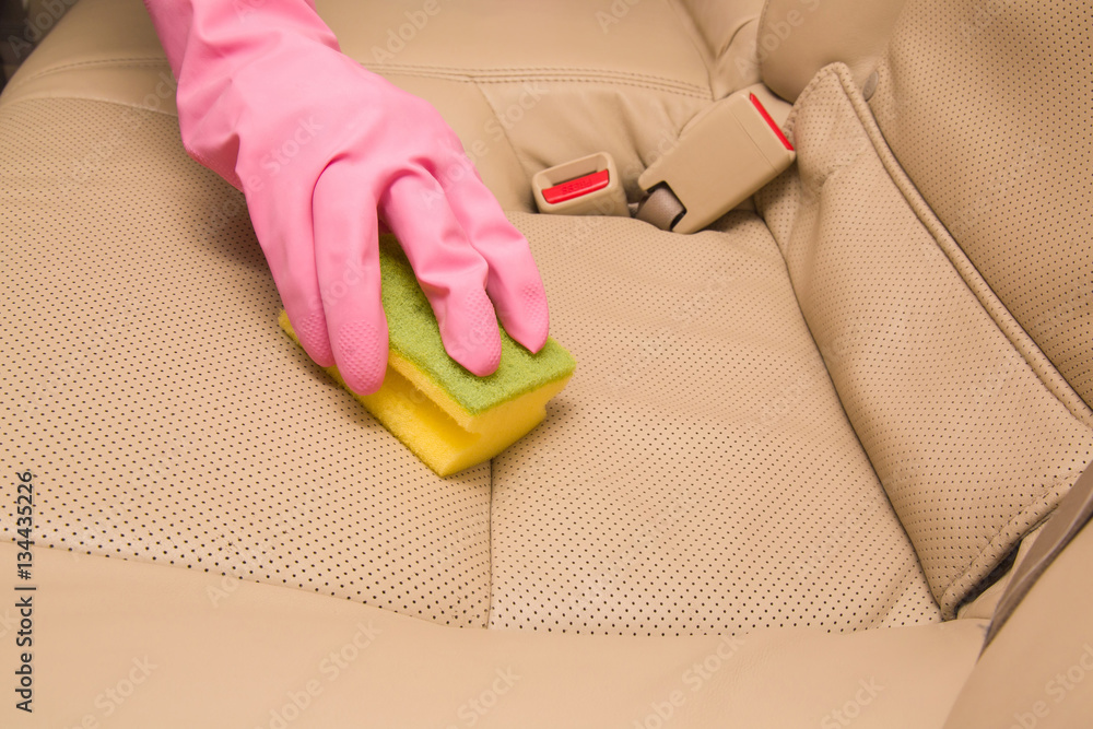 Car interior leather seats professionally chemical cleaning with sponge